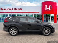 Command the road in this 2018 Honda CR-V EX-L, boasting a sleek Crystal Black Pearl exterior and a s... (image 6)