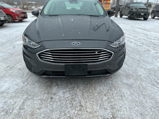 CLEAN TITLE, SAFETIED. 2019 Ford FUSION HYBRID in Cars & Trucks in Winnipeg - Image 4