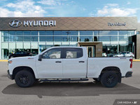 Unleash the power of the 2022 Chevrolet Silverado 1500 LTD Custom Trail Boss. This robust crew cab p... (image 1)