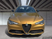 Experience the exhilarating performance of this 2023 Alfa Romeo Giulia Veloce, boasting a rare Ocra... (image 1)