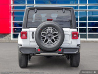 This Jeep Wrangler has a trusty Regular Unleaded V-6 3.6 L/220 engine powering this Automatic transm... (image 6)