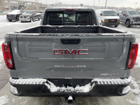 The 2025 GMC Sierra 1500 AT4X in Thunderstorm Grey Metallic is a formidable off-road truck that seam... (image 6)