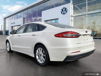 This Ford Fusion Hybrid boasts a Gas/Electric I-4 2.0 L/122 engine powering this Variable transmissi... (image 2)