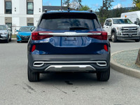 This 2023 Kia Seltos has a Blue exterior and Black seats with seating for 5. Equipped with a 1.6 L 4... (image 5)