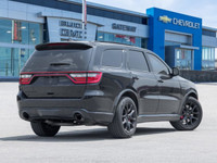 Unleash the roar. The 2024 Dodge Durango R/T AWD isn't just an SUV; it's a muscular powerhouse, a fa... (image 6)