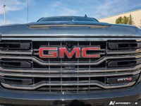 The pre-owned *2022 GMC Sierra 1500 AT4* is a rugged and refined pickup designed for drivers who nee... (image 9)