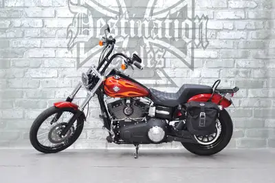 ONLY 16,640 km on this super clean, one owner, nicely loaded up, 2013 Dyna Wide Glide FXDWG! Nicely...