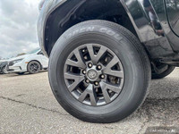 Conquer any terrain with this 2020 Toyota Tacoma Crew Cab Pickup, boasting a rugged Magnetic Grey Me... (image 9)