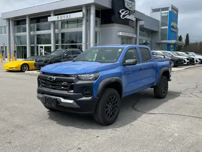 The Chevrolet Colorado 4WD Trail Boss embodies rugged capability with its striking blue exterior and...