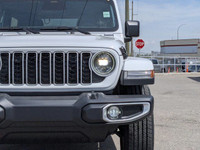 This Jeep Wrangler has a trusty Intercooled Turbo Premium Unleaded I-4 2.0 L/122 engine powering thi... (image 9)