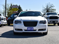 Slide into the sleek and sophisticated 2013 Chrysler 300S 3.6L, a sedan thats all about blending lux... (image 2)