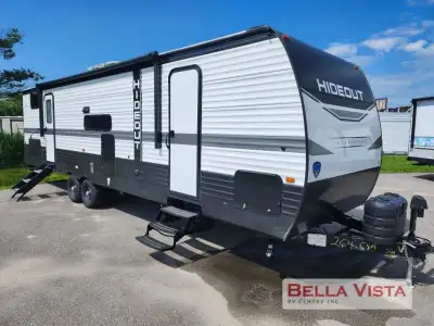 Keystone Hideout travel trailer highlights: Outside Storage Front Private Bedroom Large Slide Out Bu...
