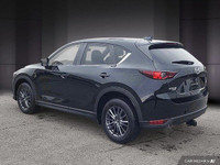 Le Mazda CX-5 GX AWD 2019 est un VUS compact qui séduit par son design élégant et sa conduite dynami... (image 4)