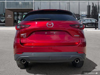 Experience the thrill of confident driving with this 2025 Mazda CX-5 PREF, boasting a sleek red exte... (image 4)