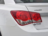 Get behind the wheel of the 2014 Chevrolet Cruze LTZ, a stylish white front-wheel-drive sedan known... (image 9)