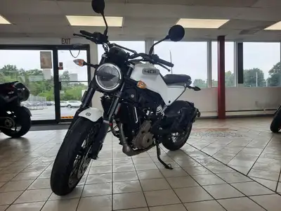 Here's an information sheet for the 2022 Husqvarna Vitpilen 401: Model: Husqvarna Vitpilen 401 Engin...