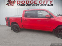 This Ram 1500 delivers a Gas/Electric V-8 5.7 L/345 engine powering this Automatic transmission. WHE... (image 5)