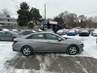 The 2023 Hyundai Elantra is a modern and stylish compact sedan that stands out with its bold design... (image 6)