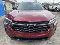 The 2025 Chevrolet Trax 2RS in Crimson Metallic is a vibrant and sporty subcompact SUV, designed to... (image 1)