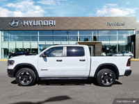 Command the road in this 2024 Ram 1500 Rebel Crew Cab, a head-turning powerhouse boasting a robust 5... (image 1)
