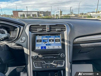 Experience effortless driving with this 2017 Ford Fusion SE. Boasting a fuel-efficient 1.5L EcoBoost... (image 7)