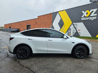 This stunning TESLA MODEL Y WITH UPGRADED LUXURIOUS Pearl White Exterior paint option with the stunn... (image 7)