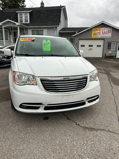 2016 Chyrsler Town and Country Touring. 186,602kms. White exterior with black suede interior. Auto-o...