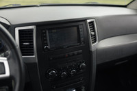 Equipped with a 420 hp 6.1L HEMI V8, AWD, Brembo brakes, and sport-tuned suspension for performance.... (image 9)