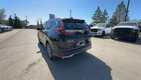 This Honda CR-V is equipped with: Leatherette/Fabric Seating Surfaces, Power moonroof, Heated front... (image 6)
