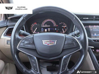 Turn heads in this stunning 2018 Cadillac XT5 Luxury AWD, boasting a vibrant Red Passion Tintcoat ex... (image 9)