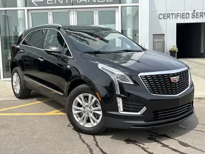 The 2024 Cadillac XT5 Luxury in Stellar Black Metallic combines refined styling with practical perfo...