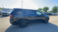 This Dodge Durango is equipped with: Cloth Bucket Seats, Power Sunroof, Heated Front Seats, Heated S... (image 8)