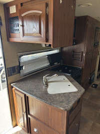 This 2011 travel trailer is waiting to be loved by it's new owners! The rear bathroom in this unit i... (image 7)