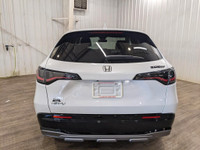 No Accidents, Service Records Available! HPD Kit The 2023 Honda HR-V EX-L Navi AWD in a pristine whi... (image 4)