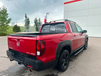 Our 2023 Honda Ridgeline Touring in Radiant Red Metallic is a local lease return! Call to book an ap... (image 5)