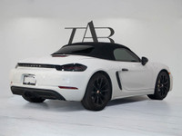 This striking 2017 Porsche 718 Boxster S Roadster delivers the thrill of open-air driving with premi... (image 3)
