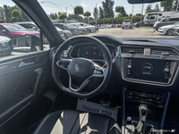 This Volkswagen Tiguan boasts a Intercooled Turbo Regular Unleaded I-4 2.0 L/121 engine powering thi... (image 8)