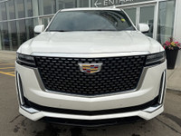 The 2022 Cadillac Escalade stands tall with commanding style and capability, finished in Crystal Whi... (image 1)