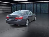 A rare and engaging manual transmission sedan offering comfort and performance. The Touring trim inc... (image 7)