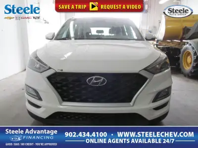 Our versatile 2019 Hyundai Tucson Preferred AWD is a knockout in Winter White! Powered by a 2.0 Litr...
