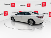The 2024 Toyota Camry Hybrid LE is a popular and efficient mid-size sedan. It's the base trim level... (image 6)