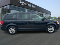 The 2019 Dodge Grand Caravan SXT is a reliable and spacious minivan, ideal for families seeking comf... (image 3)