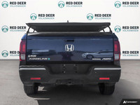 Experience the exceptional blend of power and comfort with the 2019 Honda Ridgeline Touring AWD in a... (image 5)