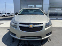 The 2014 Chevrolet Cruze 1LS offers a practical and efficient driving experience in a compact sedan.... (image 1)