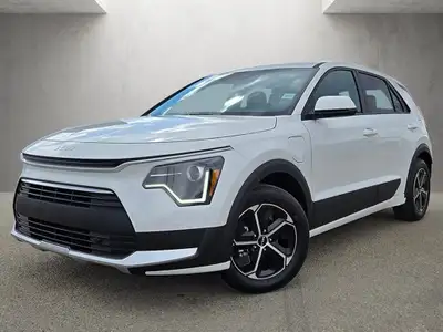 Step into the future of efficient driving with the 2025 Kia Niro Plug-In Hybrid LXa sleek crossover...