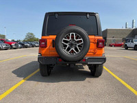 This Jeep Wrangler has a trusty Regular Unleaded V-6 3.6 L/220 engine powering this Automatic transm... (image 6)