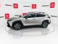 The 2024 Subaru Crosstrek Touring, particularly for the Canadian market, is a popular compact SUV th... (image 5)