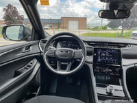 This Jeep Grand Cherokee L has a strong Regular Unleaded V-6 3.6 L/220 engine powering this Automati... (image 9)