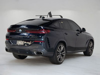 This 2020 BMW X6 M50i Coupe commands attention with aggressive styling, a powerful V8 engine, and re... (image 3)