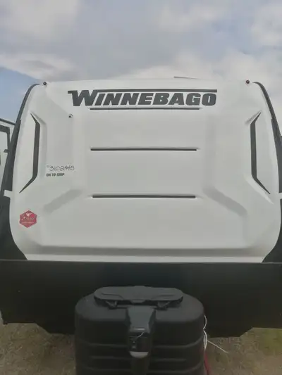 Pack your bags and head to the campground with this travel trailer! You will love all that it has to...